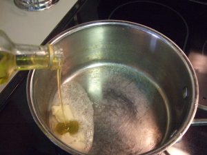 Add Oil And Butter To Sauce Pan